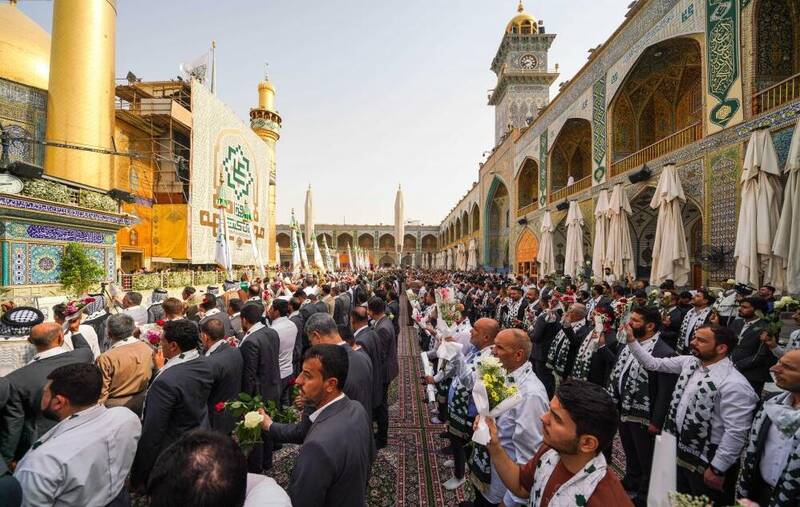 تصاویر زیبا از برافراشتن پرچم عید غدیر خم در حرم امام علی(ع)
